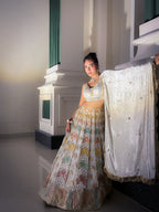 Ivory Symphony Handcrafted Kalidar Lehenga