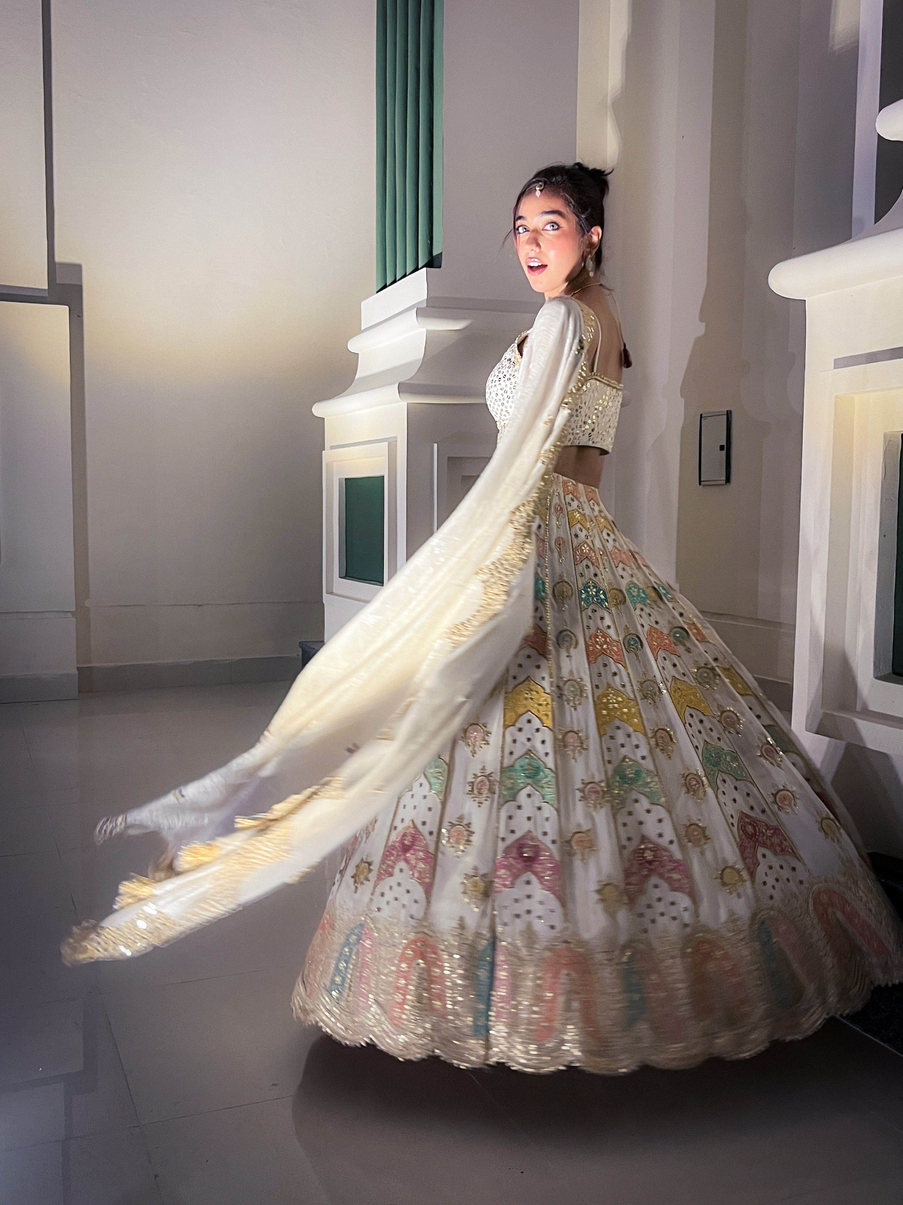 Ivory Symphony Handcrafted Kalidar Lehenga
