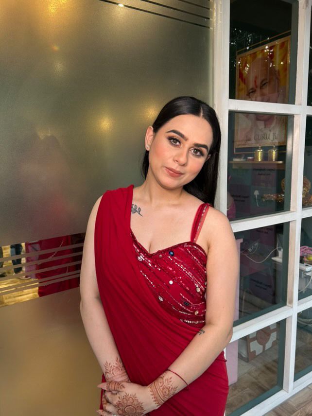 Crimson Grace: Red Drape Saree with Handcrafted Blouse Embellishments